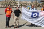 Izado de la Bandera Q de calidad